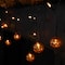 25ct. Jack-o'-Lantern Orange LED Curtain Icicle String Lights